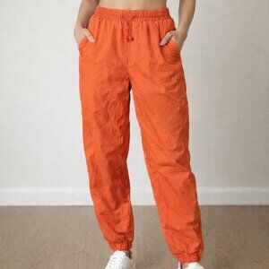 U2B size M, Orange rain resistent trackpants with drawstring waist